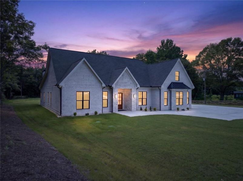 Front exterior of a new home in , Monroe, GA, highlighting curb appeal (Image 30). Front exterior of a new home in , Monroe, GA, highlighting curb appeal (Image 30).