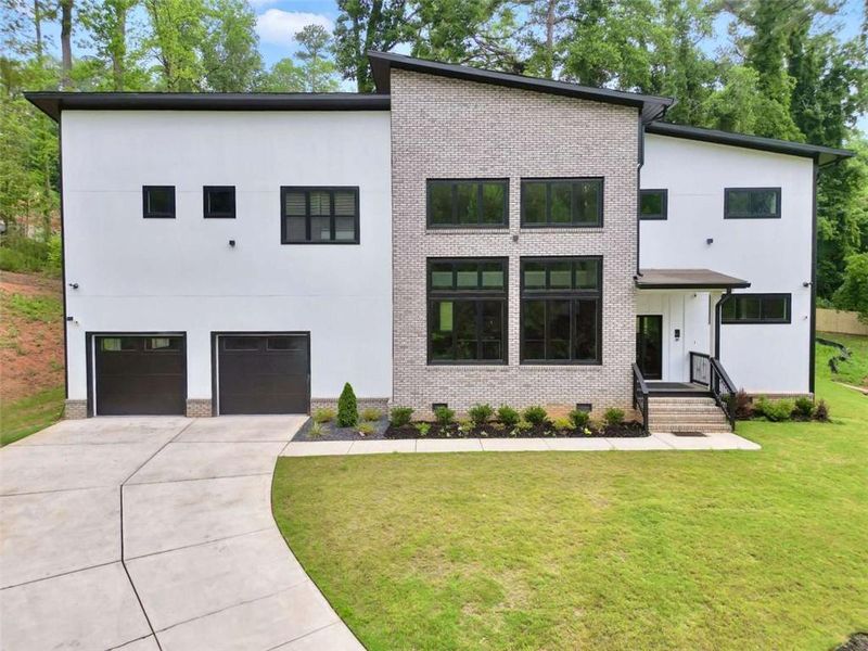 Front exterior of a new home in , Atlanta, GA, highlighting curb appeal (Image 28).
