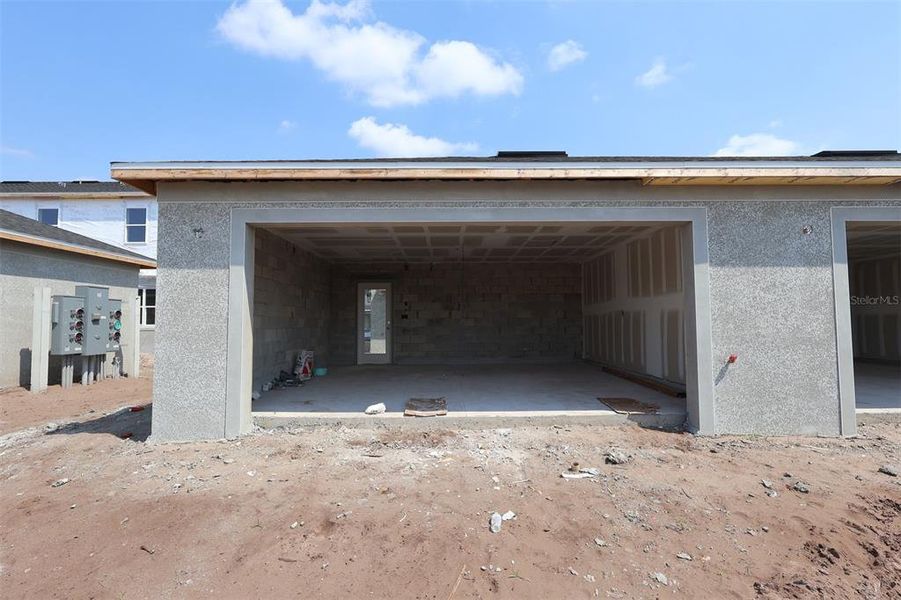In-progress construction of a new home in Center Lake on the Park, St. Cloud, FL (Image 9).