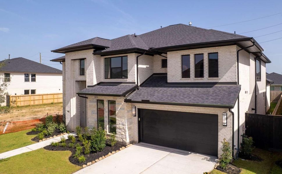 Front exterior of a new home in , Richmond, TX, highlighting curb appeal (Image 25).