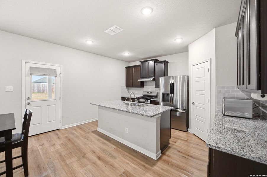 Furnished interior view inside a new home in Winding Brook, San Antonio (Image 19).