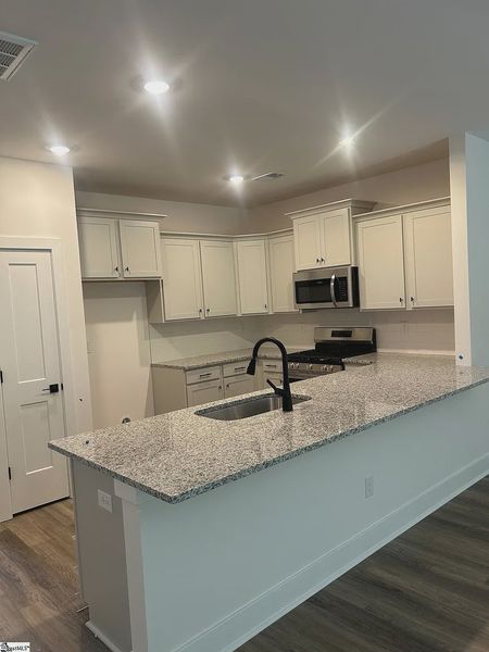 Furnished interior view inside a new home in Parkstone Place Townhomes, Roebuck (Image 3). Furnished interior view inside a new home in Parkstone Place Townhomes, Roebuck (Image 3).