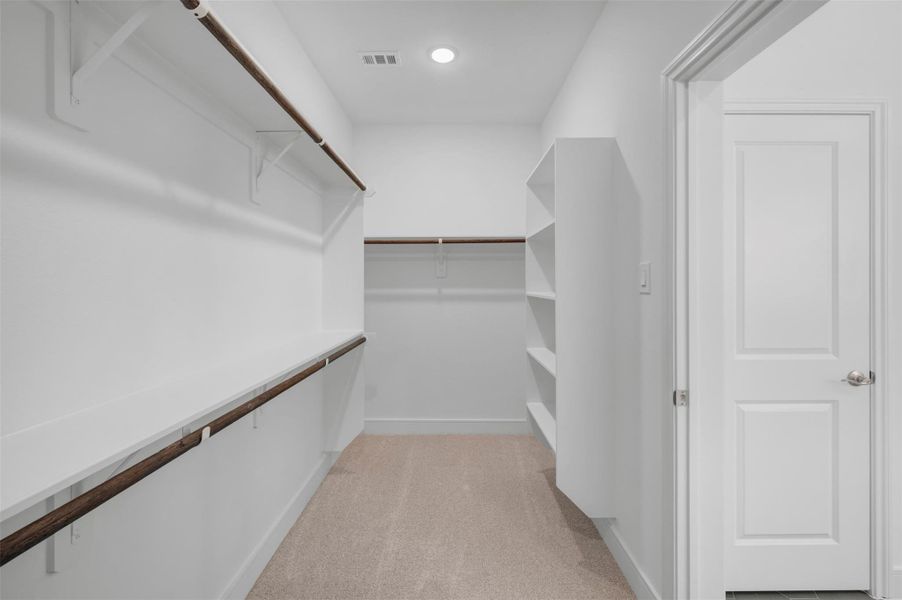 Primary walk-in closet (*Photo not of actual home and used for illustration purposes only.)