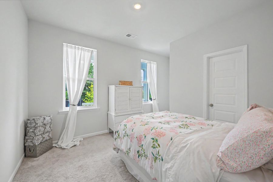 Furnished interior view inside a new home in Limehouse Village: Row Collection, Summerville (Image 16).