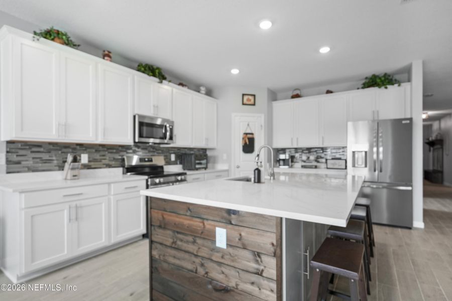 Furnished interior view inside a new home in Granary Park, Green Cove Springs (Image 17).