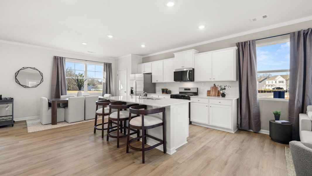 Representative furnished interior of a home built from the Elbert ll by D.R. Horton in Braselton Village, Braselton (Image 9).