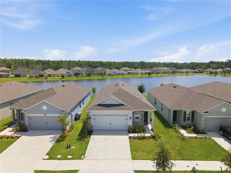 Front exterior of a new home in , Harmony, FL, highlighting curb appeal (Image 2). Front exterior of a new home in , Harmony, FL, highlighting curb appeal (Image 2).