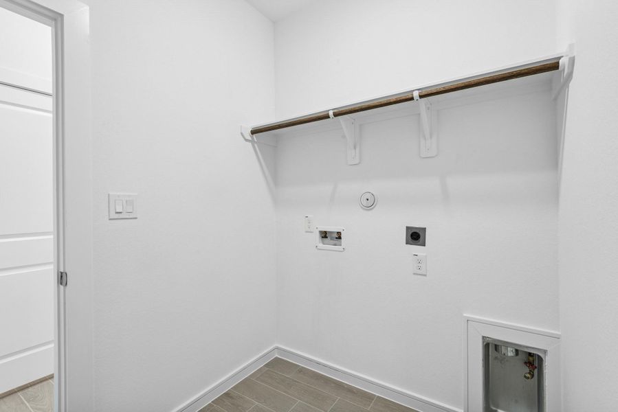 Laundry room (*Photo not of actual home and used for illustration purposes only.)