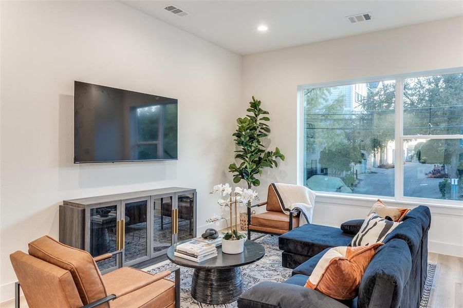 Living room featuring wood-type flooring