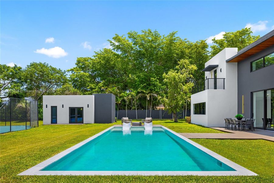 Front exterior of a new home in , Pinecrest, FL, highlighting curb appeal (Image 34).
