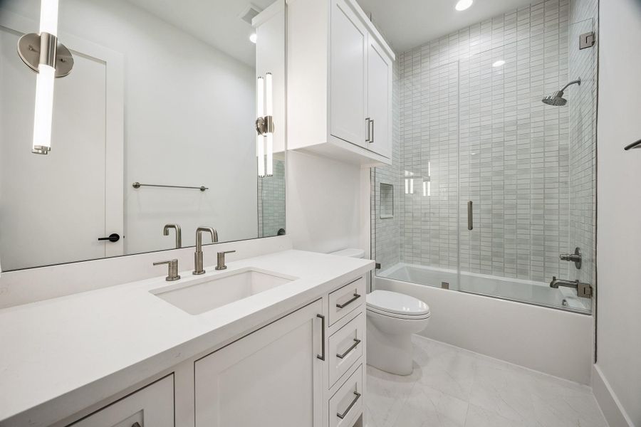 Ensuite bathroom to a secondary bedroom.