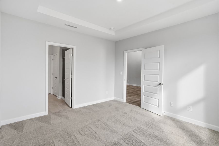 Spacious, unfurnished interior of a new home in Ovation at Sweetbrier, Durham (Image 19).