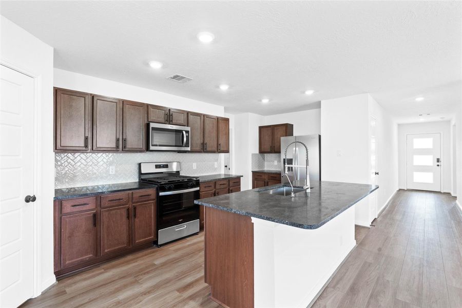 Furnished interior view inside a new home in Olympia Falls, Fresno (Image 5). Furnished interior view inside a new home in Olympia Falls, Fresno (Image 5).