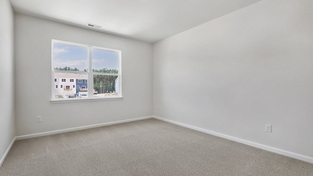 Representative unfurnished interior of a home built from the DANIEL by D.R. Horton in The Townes Park, Apex (Image 26). Representative unfurnished interior of a home built from the DANIEL by D.R. Horton in The Townes Park, Apex (Image 26).