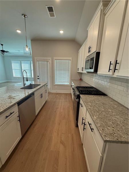 Furnished interior view inside a new home in The Fairways at Mirror Lake, Villa Rica (Image 7). Furnished interior view inside a new home in The Fairways at Mirror Lake, Villa Rica (Image 7).