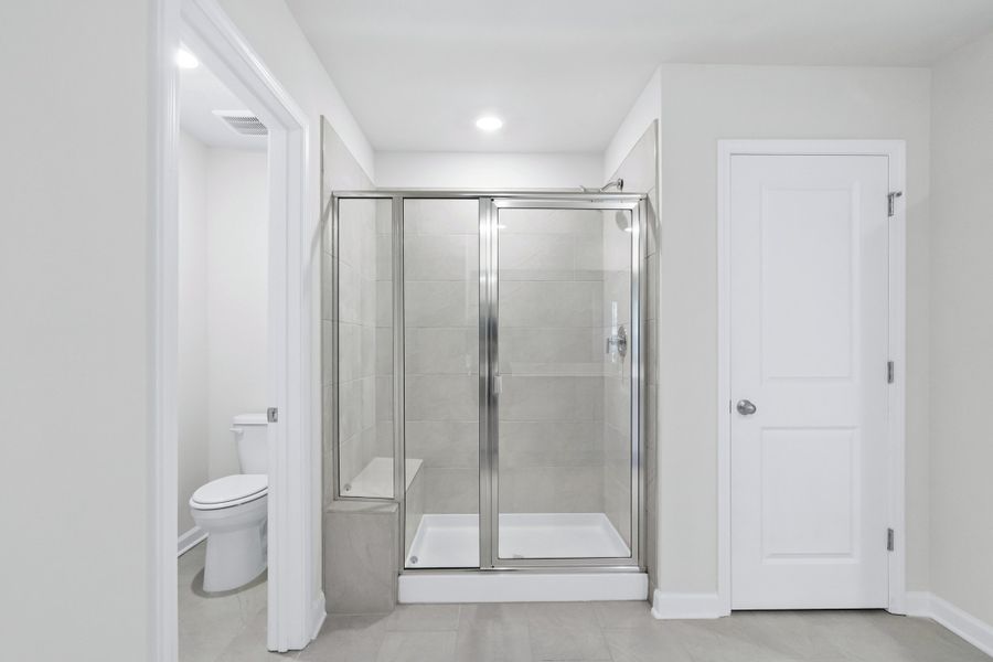 Furnished interior view inside a new home in Waterside - Coastline Series, Longs (Image 8).