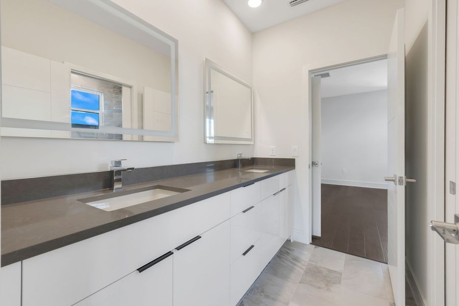 Furnished interior view inside a new home in Hampton Green at Providence, Davenport (Image 18). Furnished interior view inside a new home in Hampton Green at Providence, Davenport (Image 18).