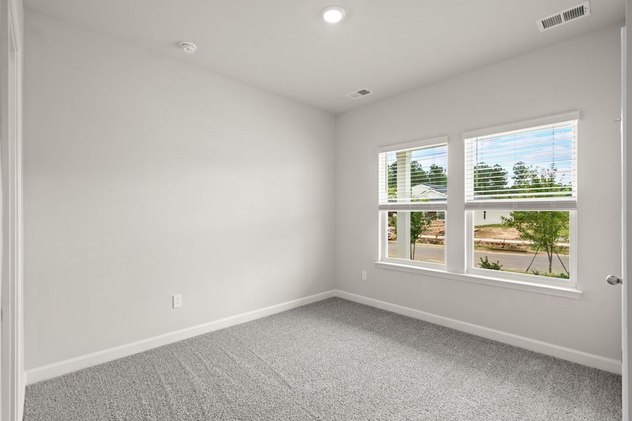 Spacious, unfurnished interior of a new home in Cypress Ridge - The Coastline Series, Longs (Image 26).