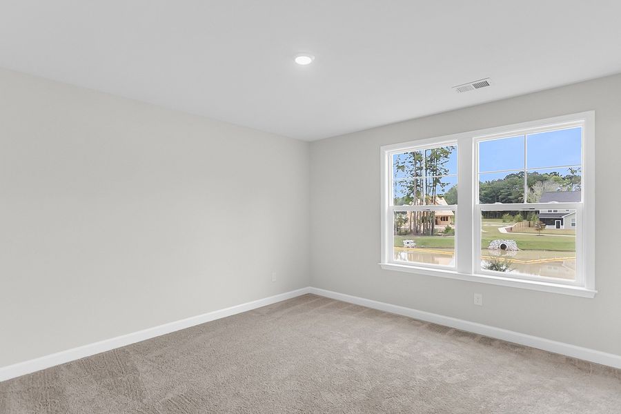 Spacious, unfurnished interior of a new home in Pineland Preserve, Summerville (Image 42).