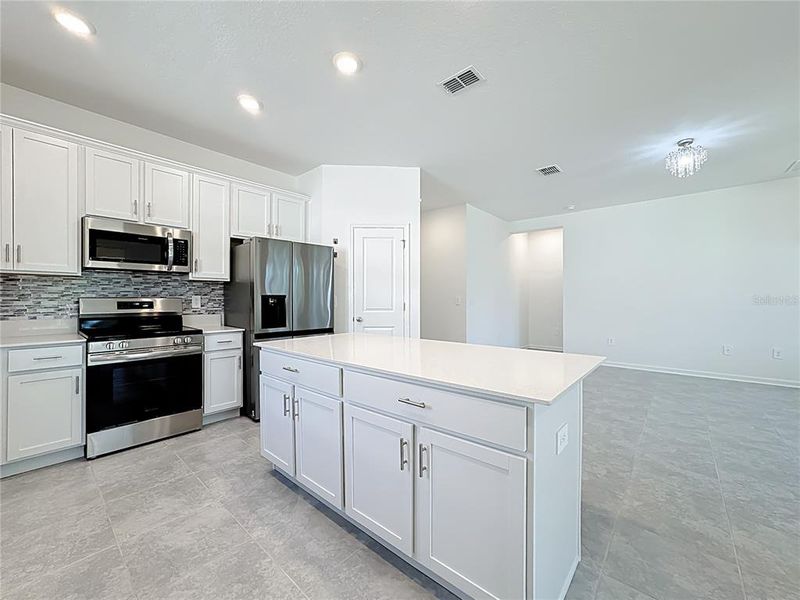 Furnished interior view inside a new home in , Kissimmee (Image 9).