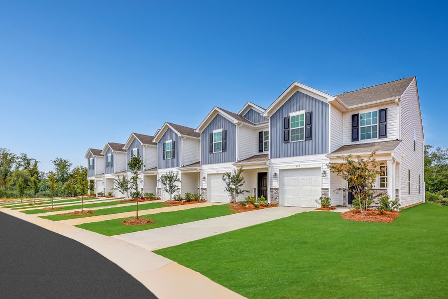 Front exterior of a new home in Kings Crossing, King, NC, highlighting curb appeal (Image 1). Front exterior of a new home in Kings Crossing, King, NC, highlighting curb appeal (Image 1).