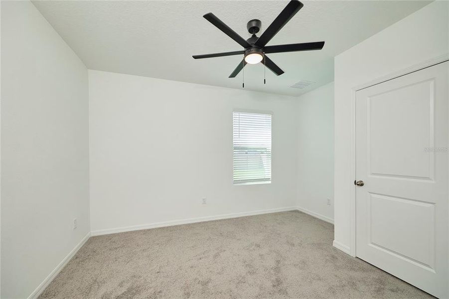 Spacious, unfurnished interior of a new home in Westgate at Avalon Park, Wesley Chapel (Image 39).
