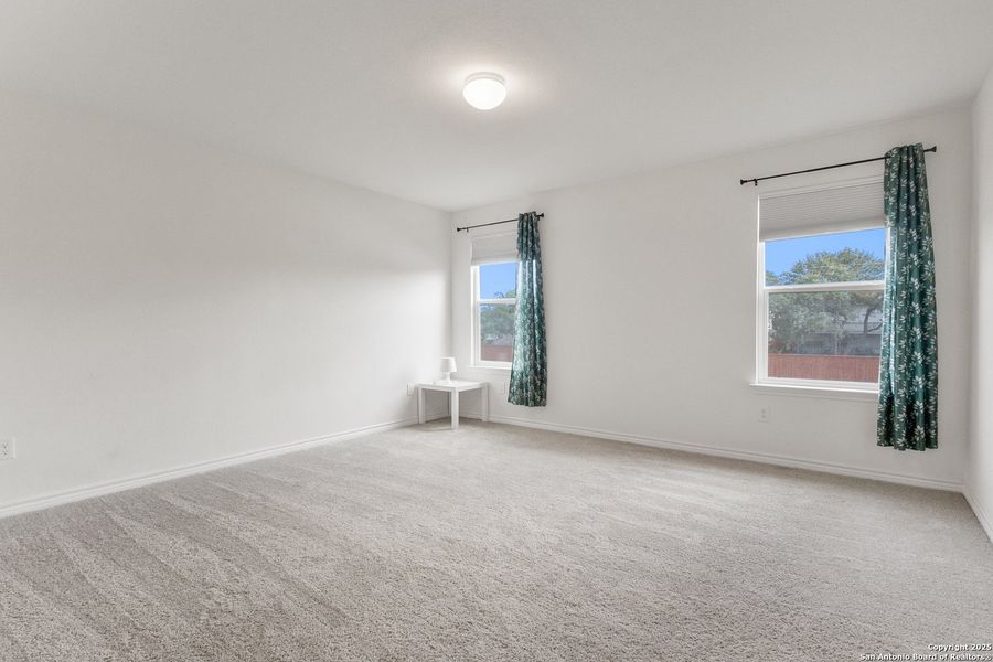 Spacious, unfurnished interior of a new home in Cove at Westover Hills, San Antonio (Image 28).