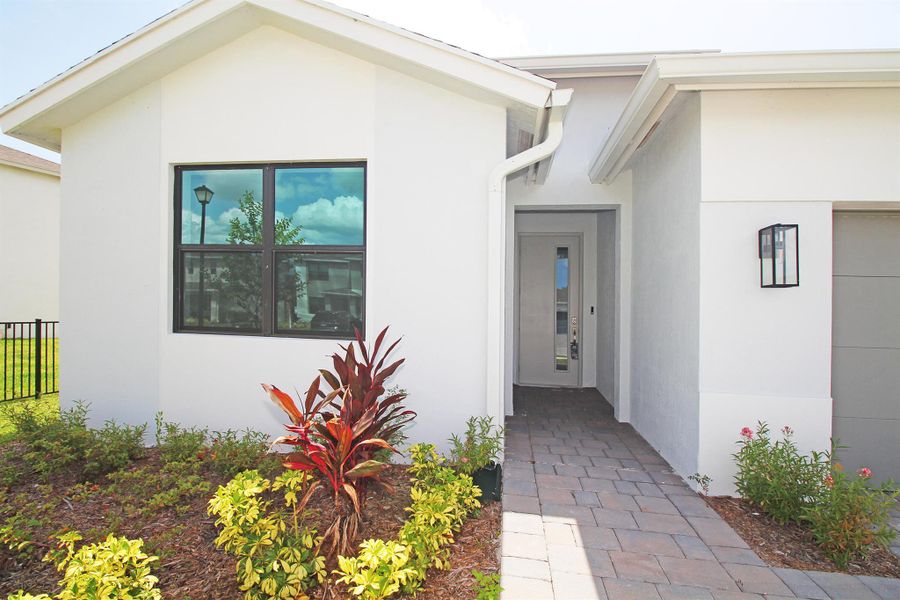 Exterior details and patio area of a home in , Stuart (Image 1).