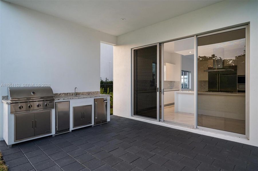 Exterior details and patio area of a home in , Weston (Image 26).