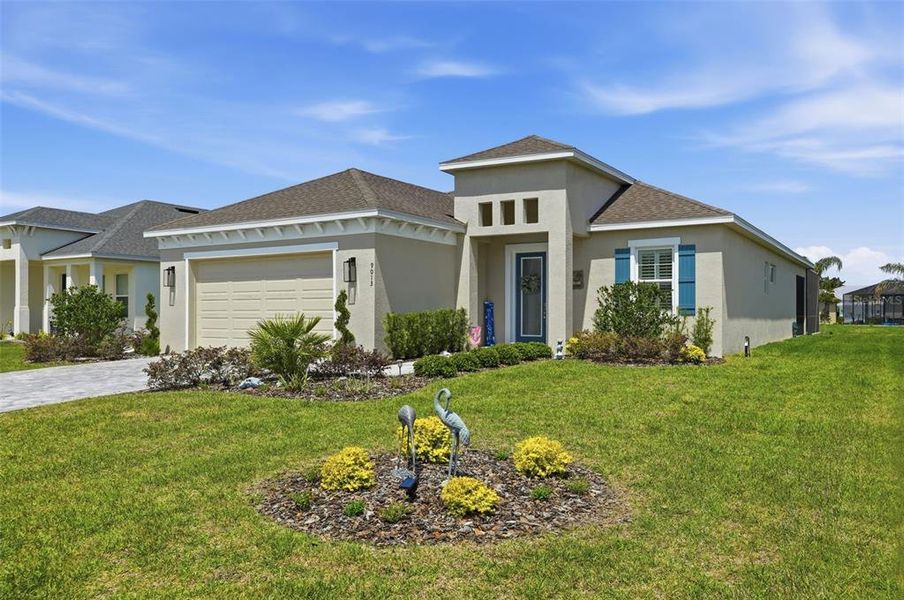 Front exterior of a new home in , Weeki Wachee, FL, highlighting curb appeal (Image 24).