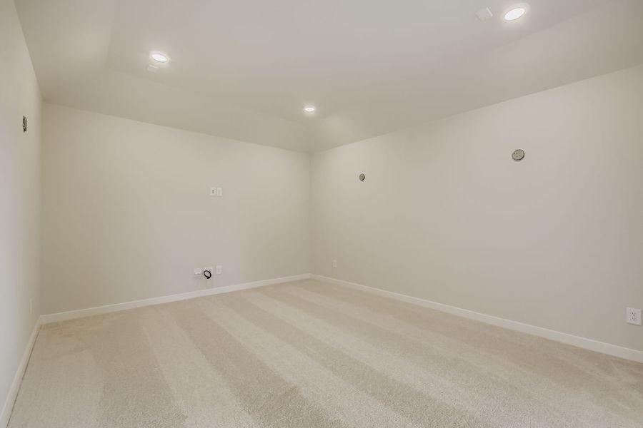 Plan 1581 | Second-Floor Media Room | Representative Photo