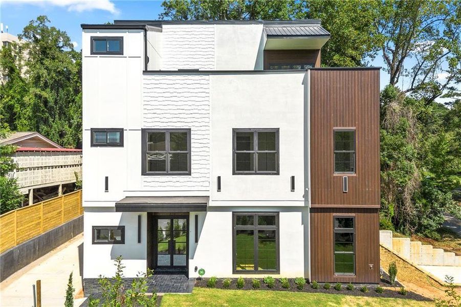 Front exterior of a new home in , Atlanta, GA, highlighting curb appeal (Image 26).