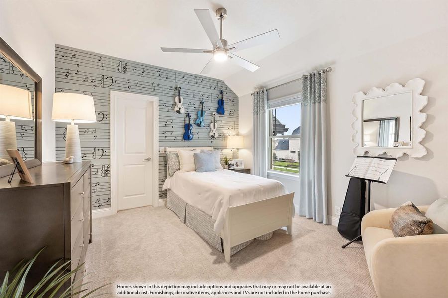 Bedroom with music note accent wall, violins displayed, ceiling fan, and carpet flooring
