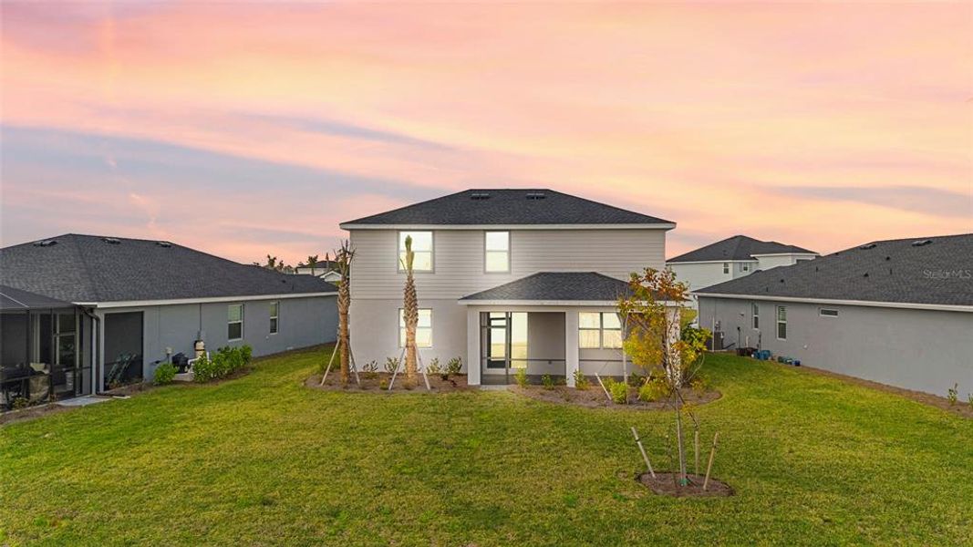 Front exterior of a new home in Tuckers Cove: Villas, Punta Gorda, FL, highlighting curb appeal (Image 24).
