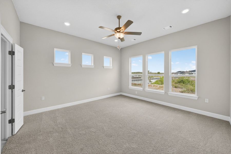 Spacious, unfurnished interior of a new home in Whisper Valley, Manor (Image 18).