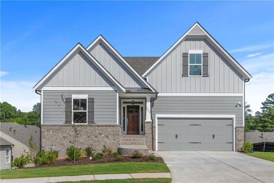 Front exterior of a new home in , Gainesville, GA, highlighting curb appeal (Image 1).