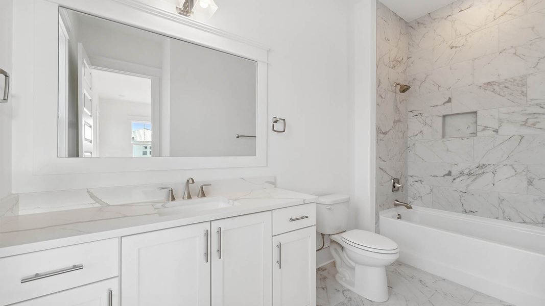 Representative furnished interior of a home built from the Cayman by D.R. Horton in Parkside, Santa Rosa Beach (Image 16).