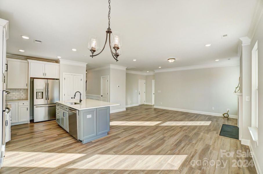 This home features all white cabinets and island