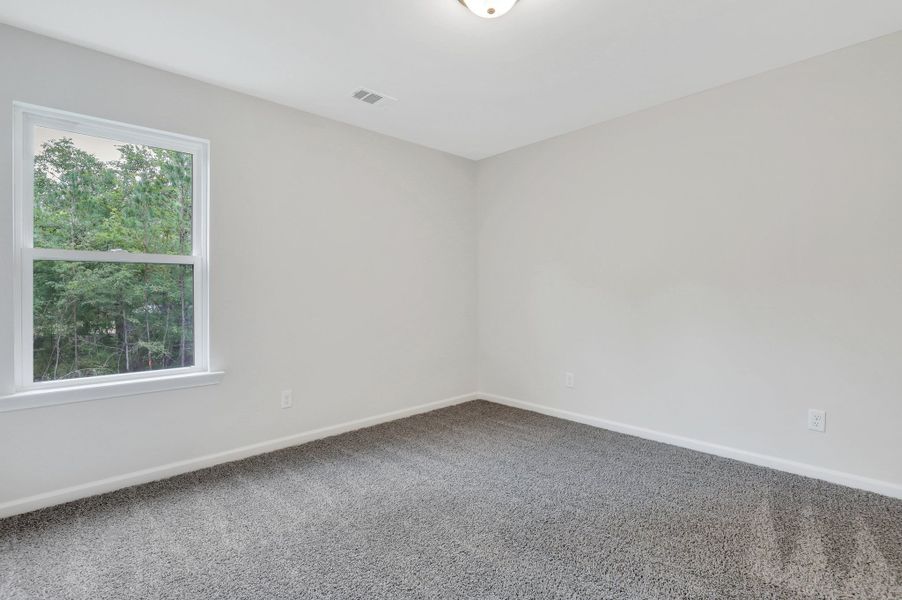 Representative unfurnished interior of a home built from the The Brookhaven by Smith Family Homes in Ramsey Landing, Rincon (Image 24).