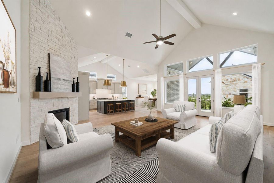 The Living Area, with a gaslog fireplace with full stone surround, vaulted beamed ceiling, clerestory windows, full glass pane windows and doors that lead to the Back Porch. This photo has been virtually staged.