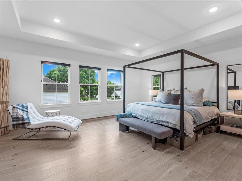 The primary bedroom boasts plenty of space for a sitting area.