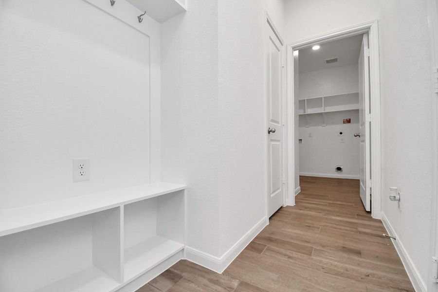 Spacious, unfurnished interior of a new home in Sunterra, Katy (Image 26).