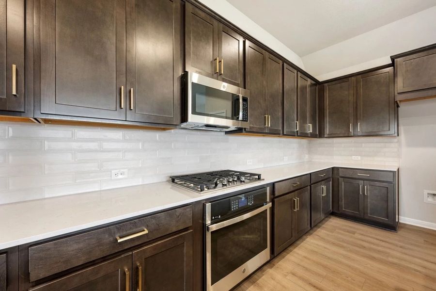 Furnished interior view inside a new home in The Colony 50s, Bastrop (Image 13).