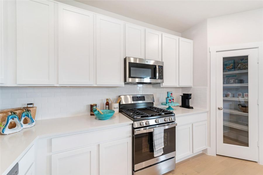 Furnished interior view inside a new home in Massey Oaks, Pearland (Image 7).