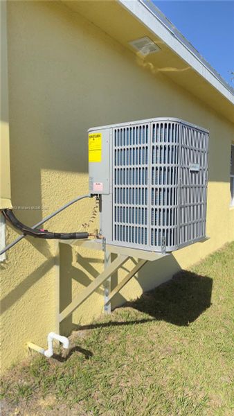 Front exterior of a new home in , Fort Myers, FL, highlighting curb appeal (Image 10).