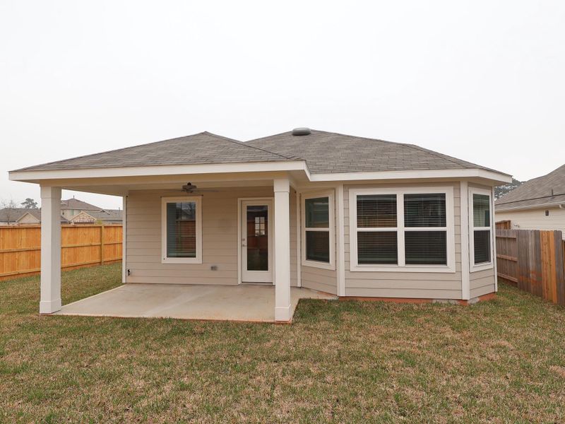 Exterior details and patio area of a home in Moran Ranch, Willis (Image 14).