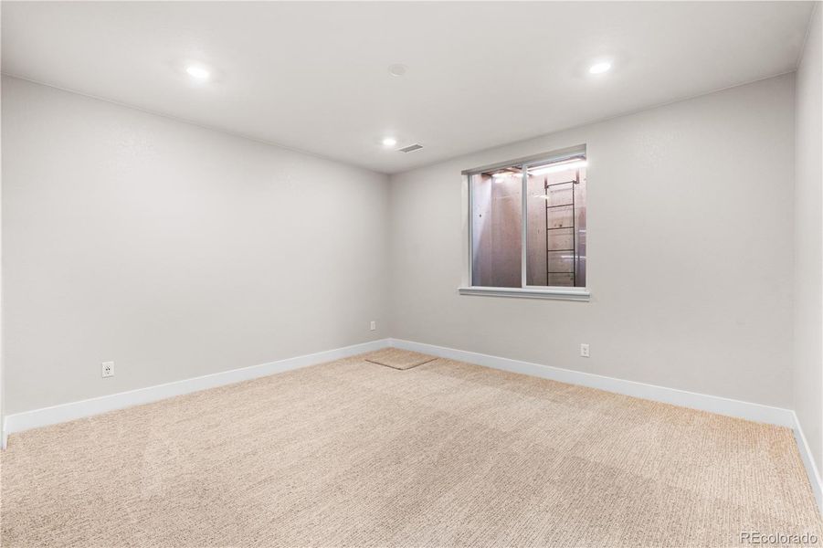 Spacious, unfurnished interior of a new home in Luxe at The Canyons, Castle Pines (Image 39).