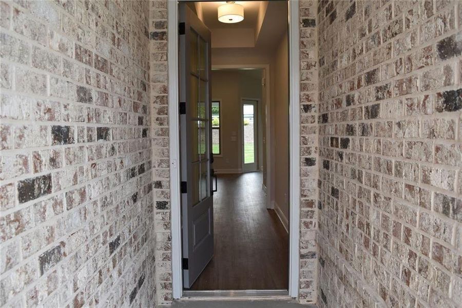 Exterior details and patio area of a home in Soleil Summit Chase, Snellville (Image 13).