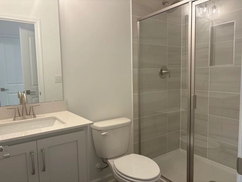 Guest Bath featuring the AW Collection® Milan - Decorative accents meet tailored, refined style.