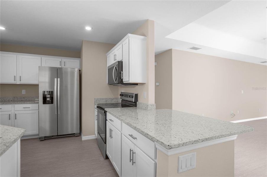 Furnished interior view inside a new home in , Floral City (Image 12).
